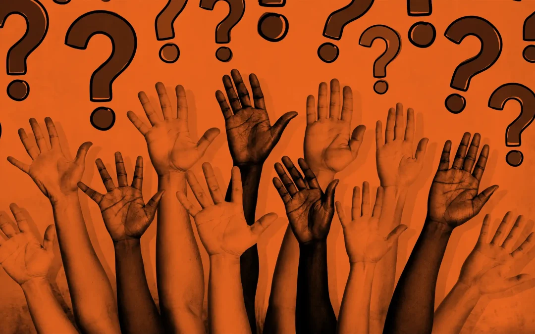 Loads of raised hands with question marks above